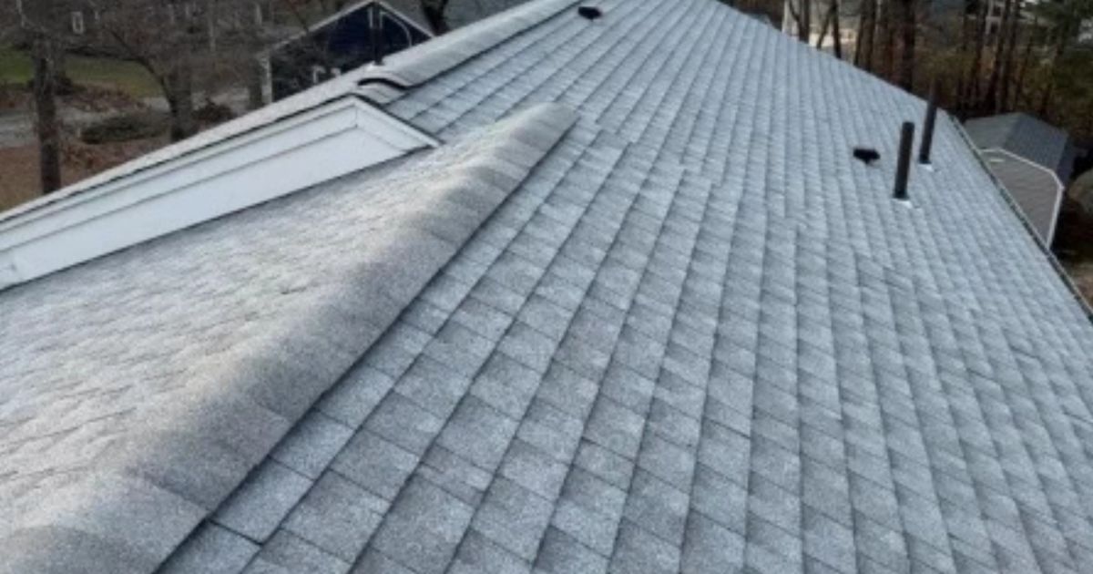 Ridge ventilation integrated into an asphalt shingle roof on a Massachusetts home.