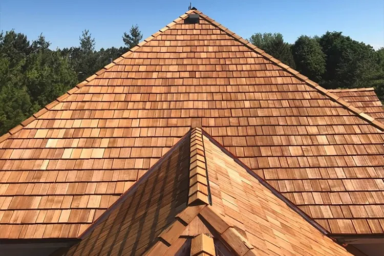 High-quality cedar wood shingle roof installed on a residential property