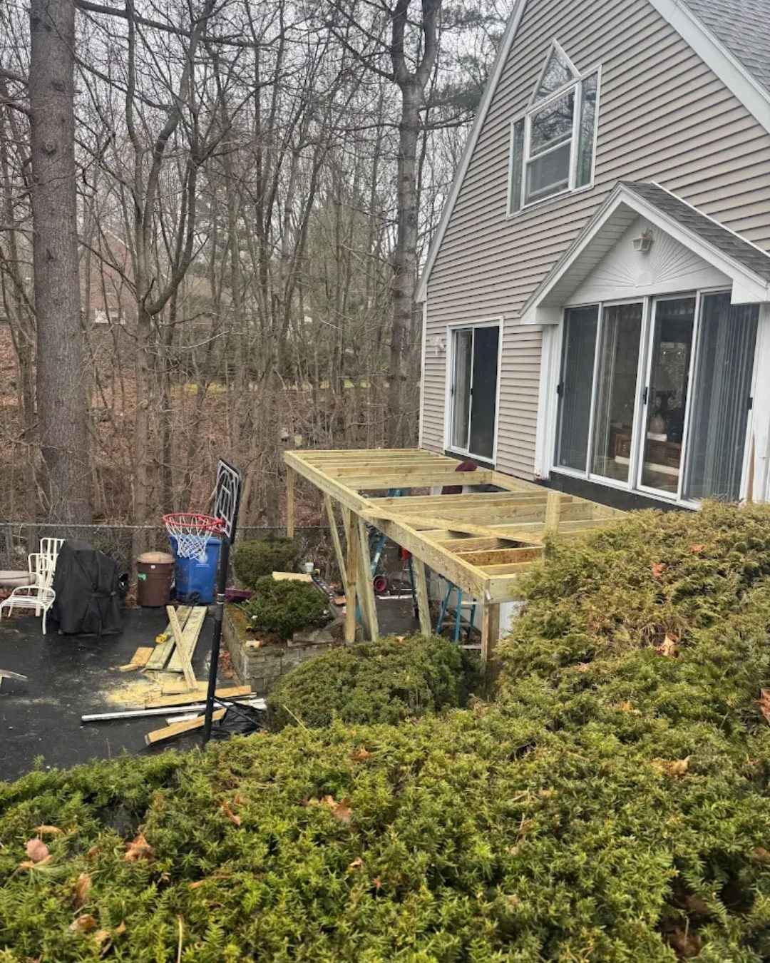 Custom exterior carpentry completed by Clough Construction on a Massachusetts home.