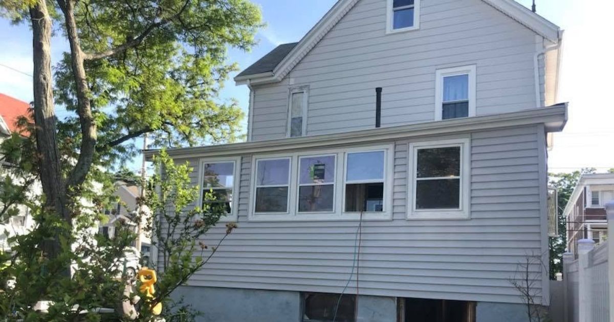Completed porch and window exterior renovation by Clough Construction