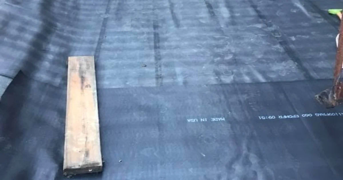 EPDM rubber roofing installed on a low-slope residential addition in Massachusetts.