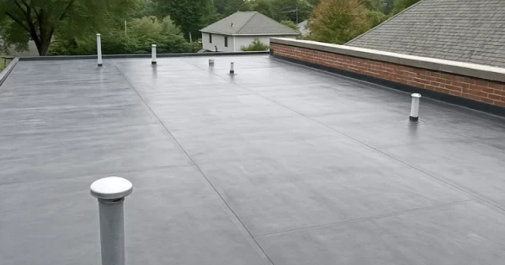 Completed EPDM rubber roofing installation on a flat roof by Clough Construction in Greater Boston, Massachusetts.