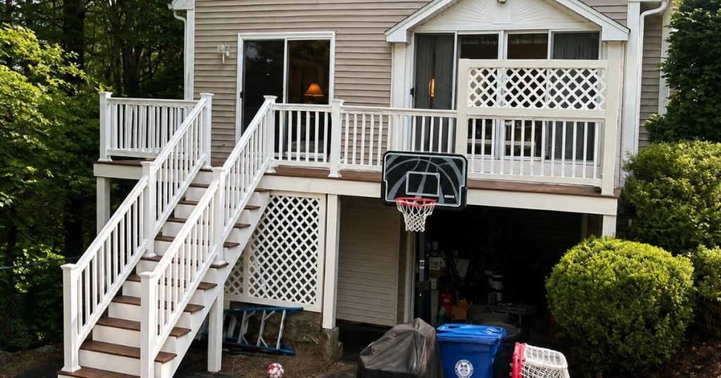 New wood porch and exterior stairs built by Clough Construction