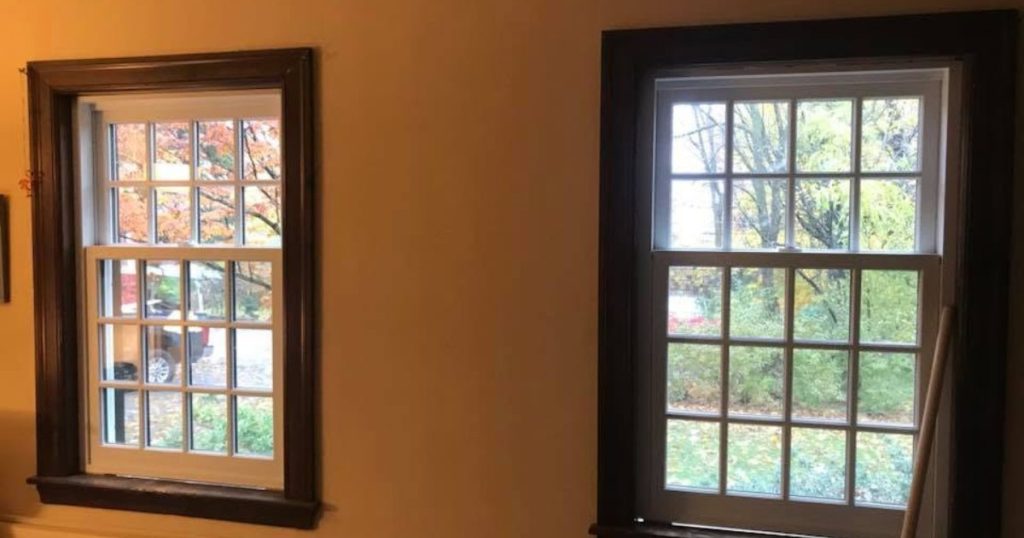 Completed double-hung replacement windows viewed from inside a residential home.