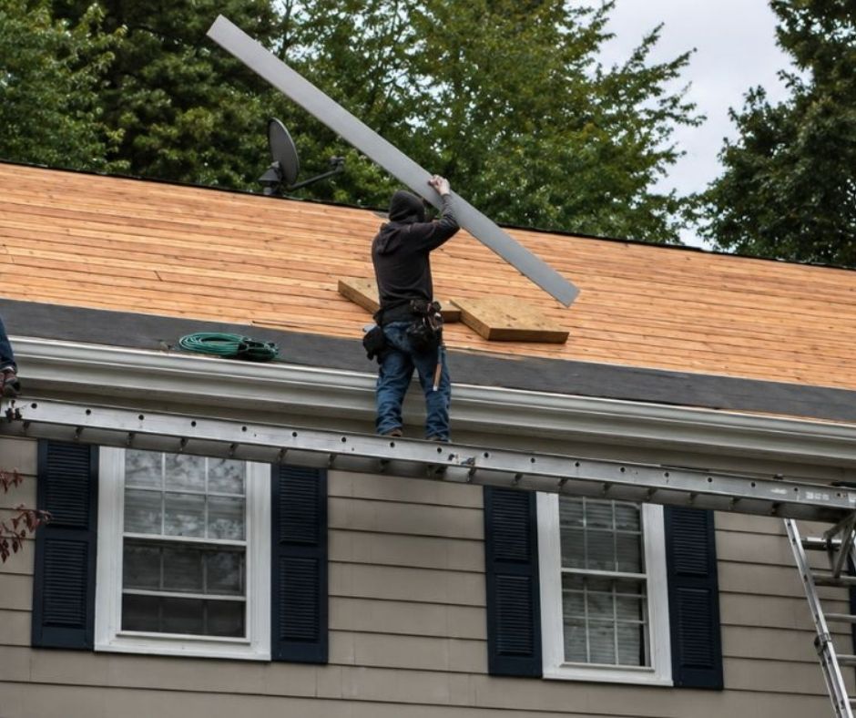 Exposed wood roof deck prepared for asphalt shingle replacement