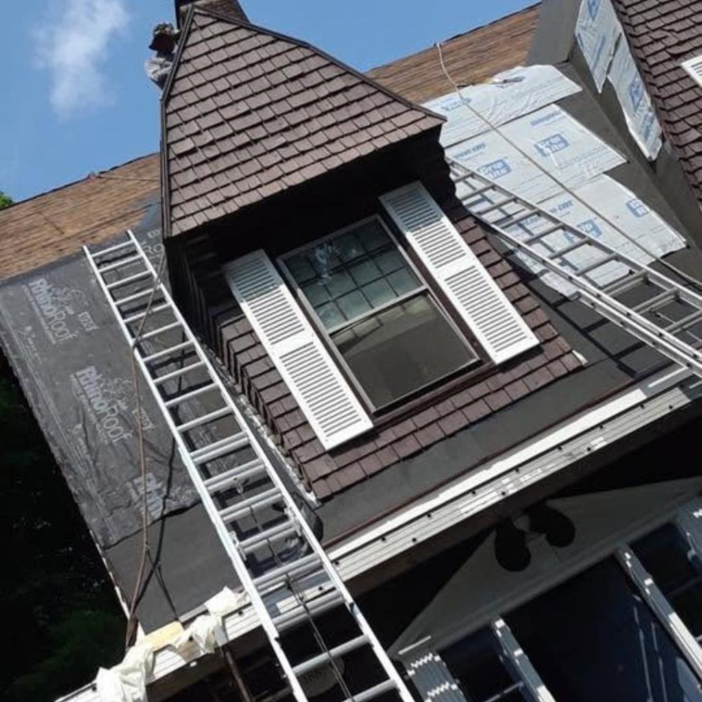 Exposed roof decking during residential asphalt shingle roof replacement