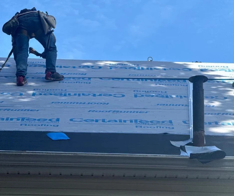 Roof inspection identifying signs that a Massachusetts home needs roof replacement.