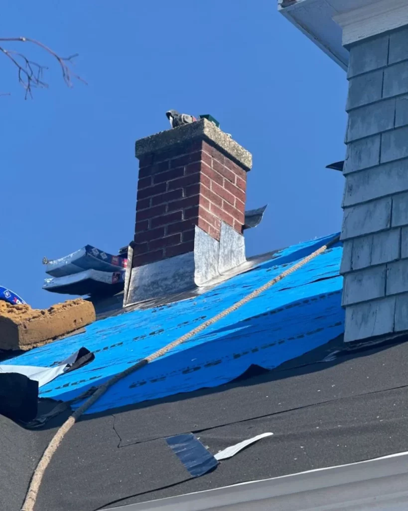 Professional roof repair completed by Clough Construction in Massachusetts.