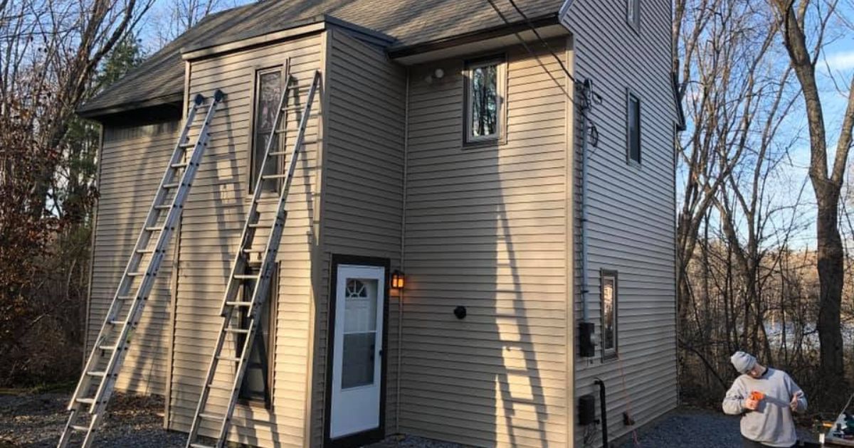 Finished window trim and siding details on a Massachusetts home.